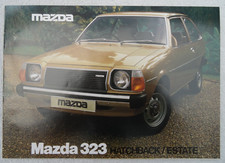 MAZDA 323 Brochure 1979: Hatchback 1000, 1300, 1400. Estate. Specifications.12pg
