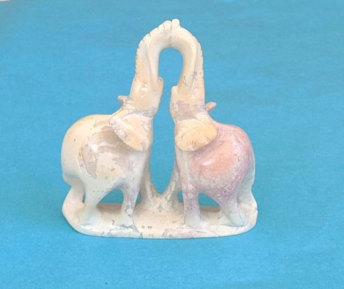 Pair kissing elephants - a,