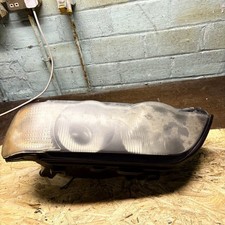 BMW X5 E53 N/S PASSENGER SIDE HEADLIGHT 151832-00 HELLA 151774-02
