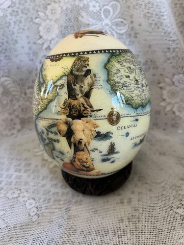 Ostrich egg decorated with - ostrich,