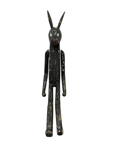 Hand carved wooden rabbit - hand,