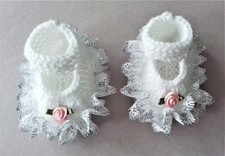 Hand knitted dolls clothes