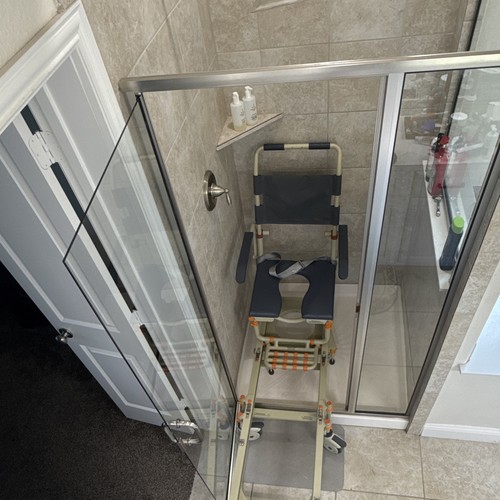 Gray wheeled shower transfer - shower,