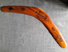 Hand-carved wooden boomerang