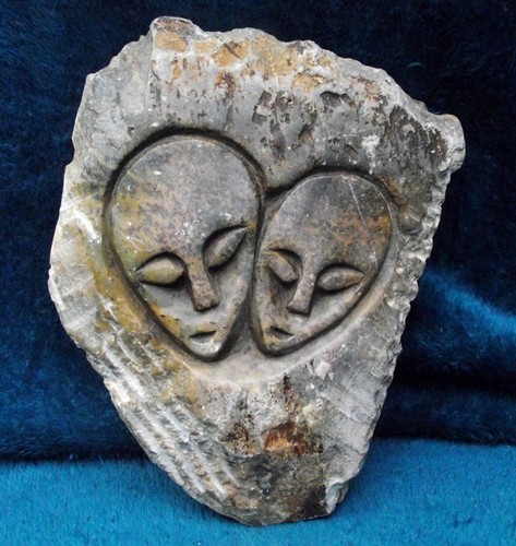 Faces carved into - carved,