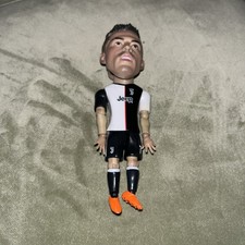 This is a Cristiano Ronaldo action figure wearing a Juventus FC home kit.