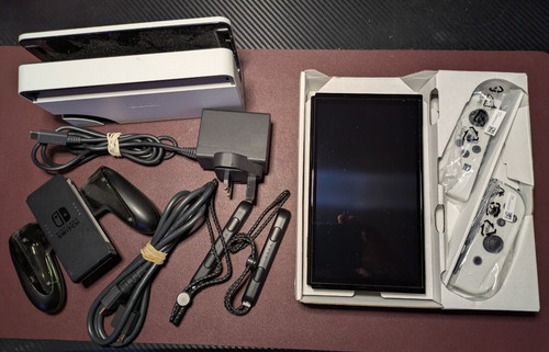 Nintendo switch oled 64gb - nintendo,