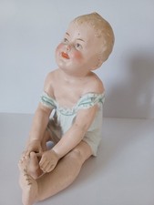 Gebruder Heubach Seated Piano