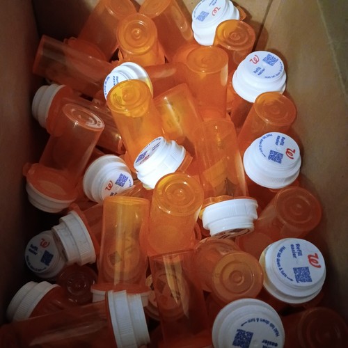 Empty amber pill bottles - empty,
