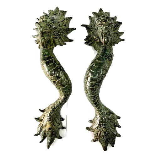 Brass dragon grabs - 2, cast