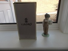 NAO PORCELAIN FIGURE BOY WITH