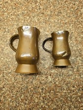 Two Antique Copper Measuring