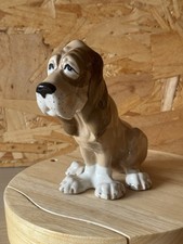 Szeiler Sitting Bloodhound Dog