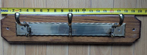 Three brass hooks - three, mounted