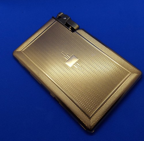 1950s gold tone tiki cigarette - tone,