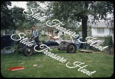 Young Men Rat Rod Racing Car