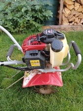 Mantis Tiller Honda Engine GX 25 4-Stroke with aerator wheels