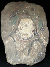 NEAR EASTERN A LARGE GANDHARAN/ CHINESE BUDDHA'S PAINTED STUCCO PANEL PAINTING