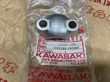 KAWASAKI NOS FRONT AXLE HOLDER