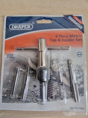 Draper metric tap and - and, holder