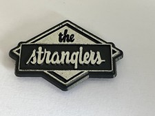 VINTAGE THE STRANGLERS PLASTIC PIN BADGE