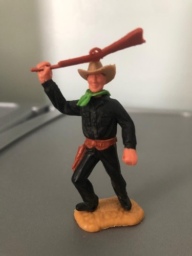 Timpo cowboy with - with, rifle