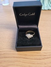 boat shaped 9 diamond ring 18 carat gold.Size K From Beaverbrooks