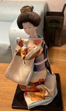 Elegant Japanese Geisha Doll,  Cream and orange  Kimono.? Silk