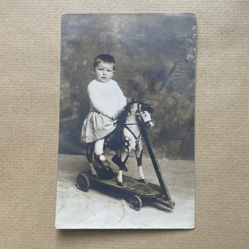 Postcard child rocking - of,