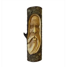 Tree trunk carving old man