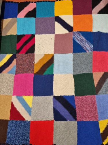Hand knitted patchwork bed - knitted,