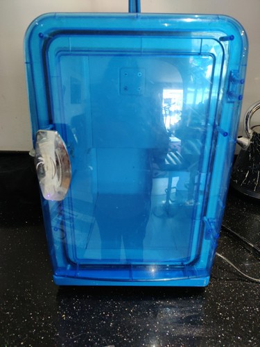 Blue carry fridge goes - it,