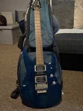 rare, and collectable electric Maverick F3 guitar is in translucent blue.