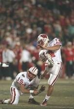 Place kicker John Hall kicks