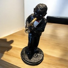 A figurine of a musician