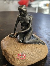 Little Mermaid Statue On Rock