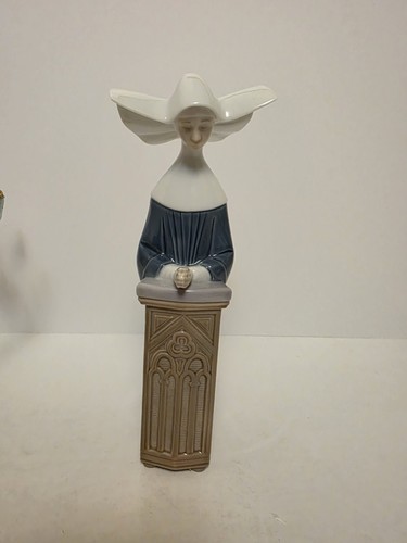 Lladro figurine kneeling nun - lladro,