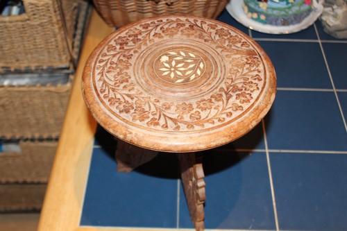 Small round asian hand carved