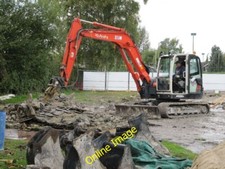 Photo 6x4 Breaking up the base Cholsey The mini digger with a pecker atta c2012