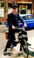Gerard Cox on a solex moped in