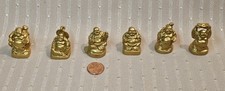 GROUPING OF 6 GOLD TONE BUDDHA