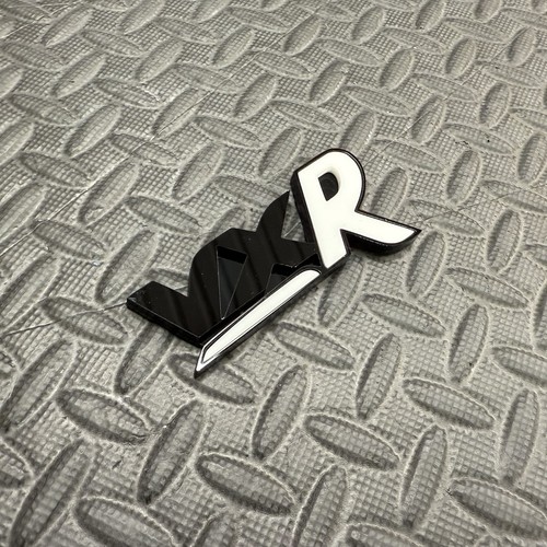 Vxr tailgate grille badge - or,