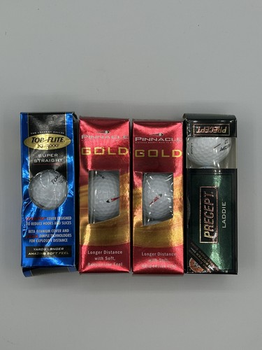 Four packs unused golf - packs, of