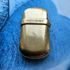 Vintage Yves Saint Laurent Gold Plated Lighter. Blue Saphire Cabochon