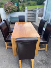 solid oak dinning table and 6