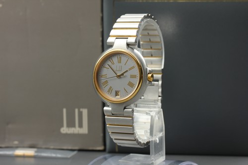 Near mint dunhill - mint], millenium