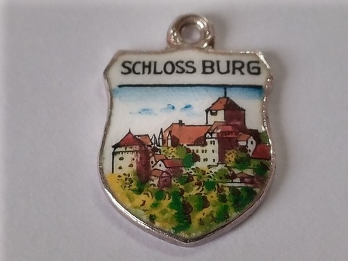 Silver travel shield charm