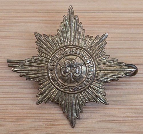 Vintage brass cap badge - cap, from