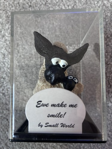 Small world collectables - small,