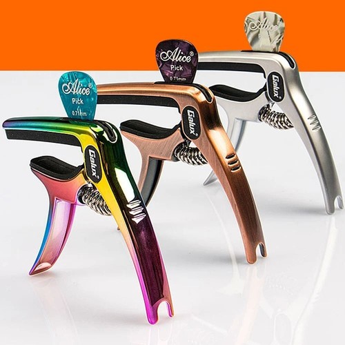 Guitar capo with pick holder - with,
